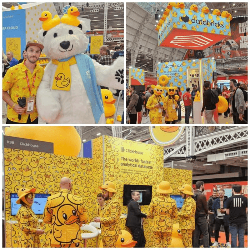 Attendees and characters at a lively exhibition featuring yellow rubber duck branding.